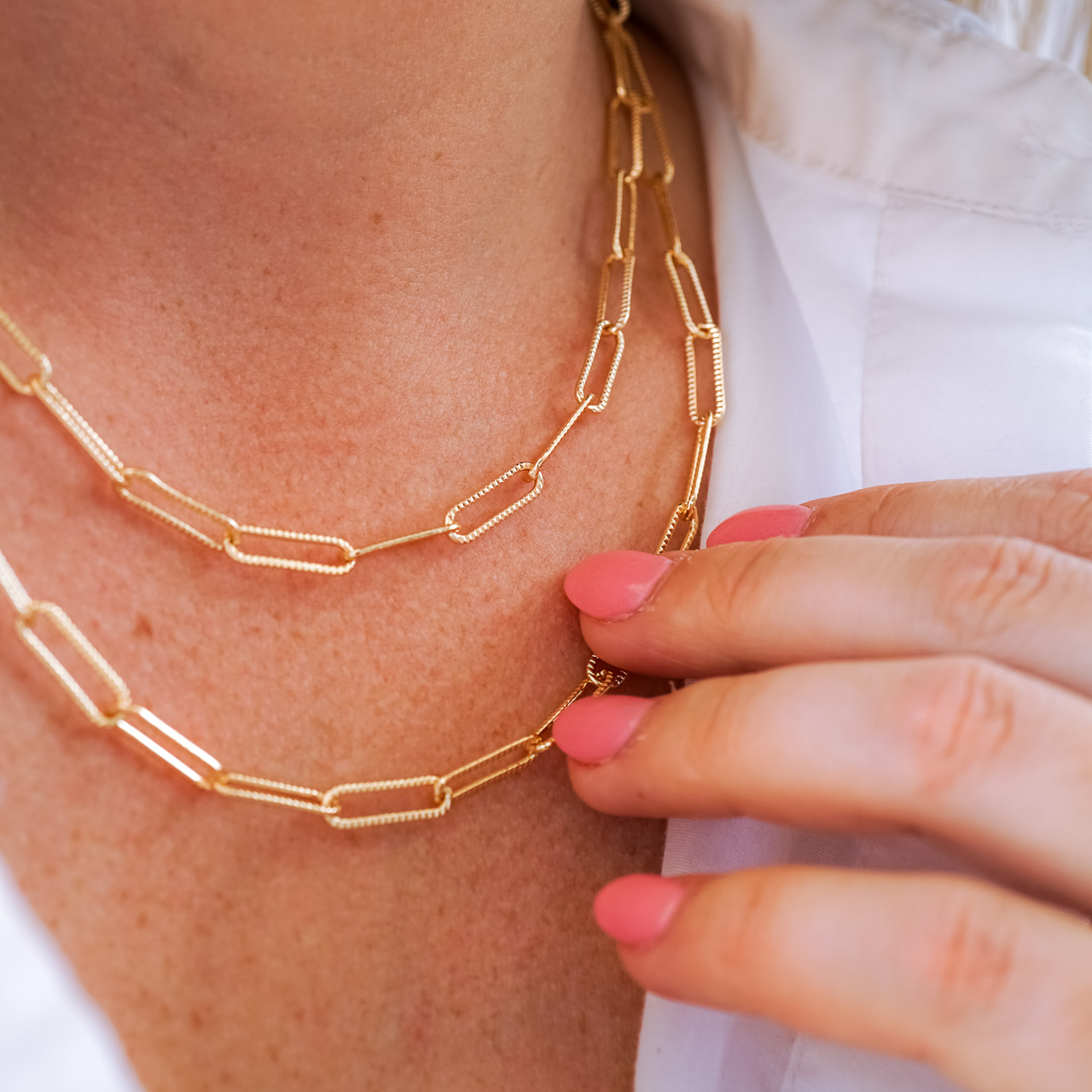 How To Expertly Layer Your Necklaces
