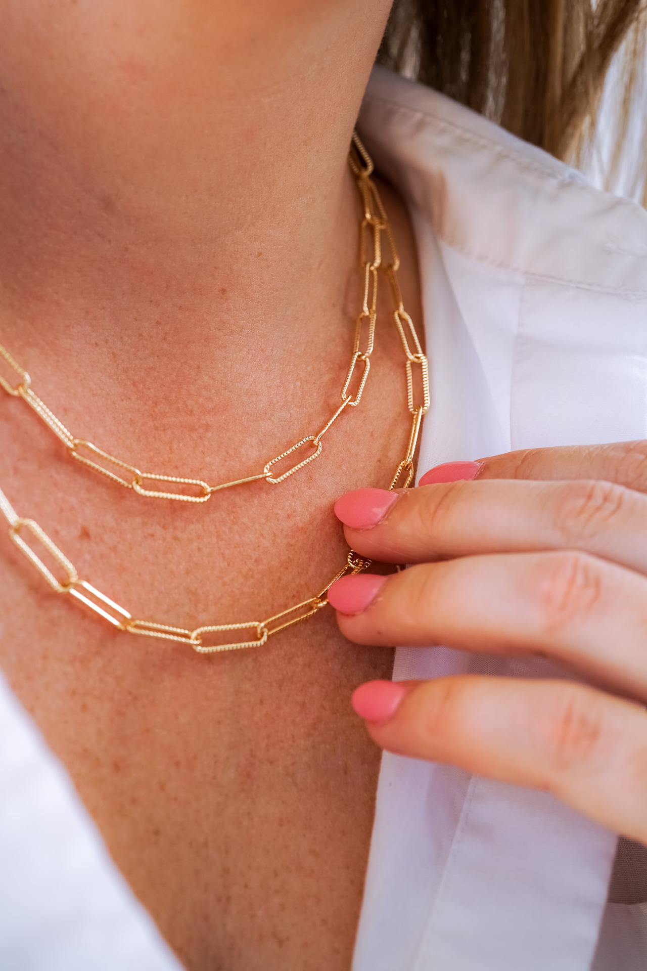 How To Expertly Layer Your Necklaces